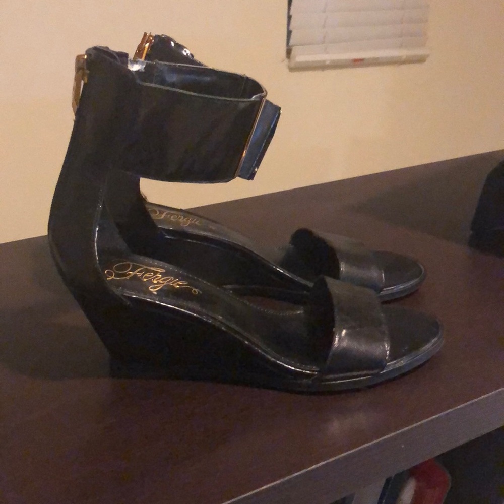 Black wedge with open toe and ankle strap